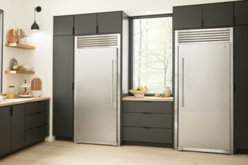 Image of single door Electrolux fridge and single door Electrolux freezer in a luxury kitchen.