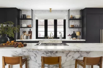 A modern kitchen designed by Bobby Berk featuring Dacor appliances