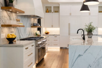 An all-white luxury kitchen designed by Designing Dreams designers Angel and Jerrilynn.