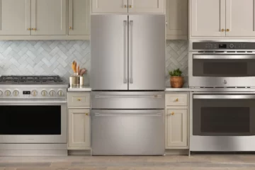 GE Profile wall oven, Monogram induction range, and Café fridge displayed together in a modern kitchen