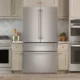 GE Profile wall oven, Monogram induction range, and Café fridge displayed together in a modern kitchen