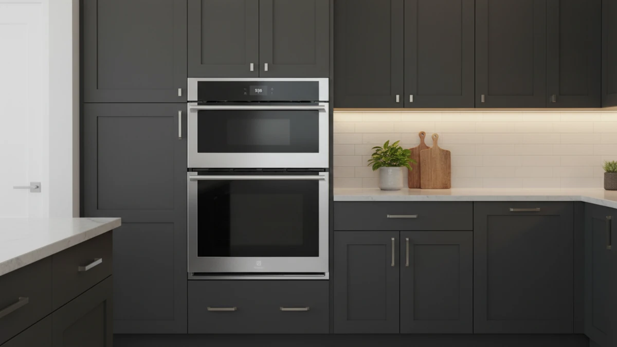 Electrolux ECWM3011AS 30-inch combo unit installed in modern kitchen with dark gray cabinets and white countertops