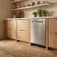 Bosch 800 Series SHP78CM5N dishwasher in a warm minimalist kitchen with light oak cabinets