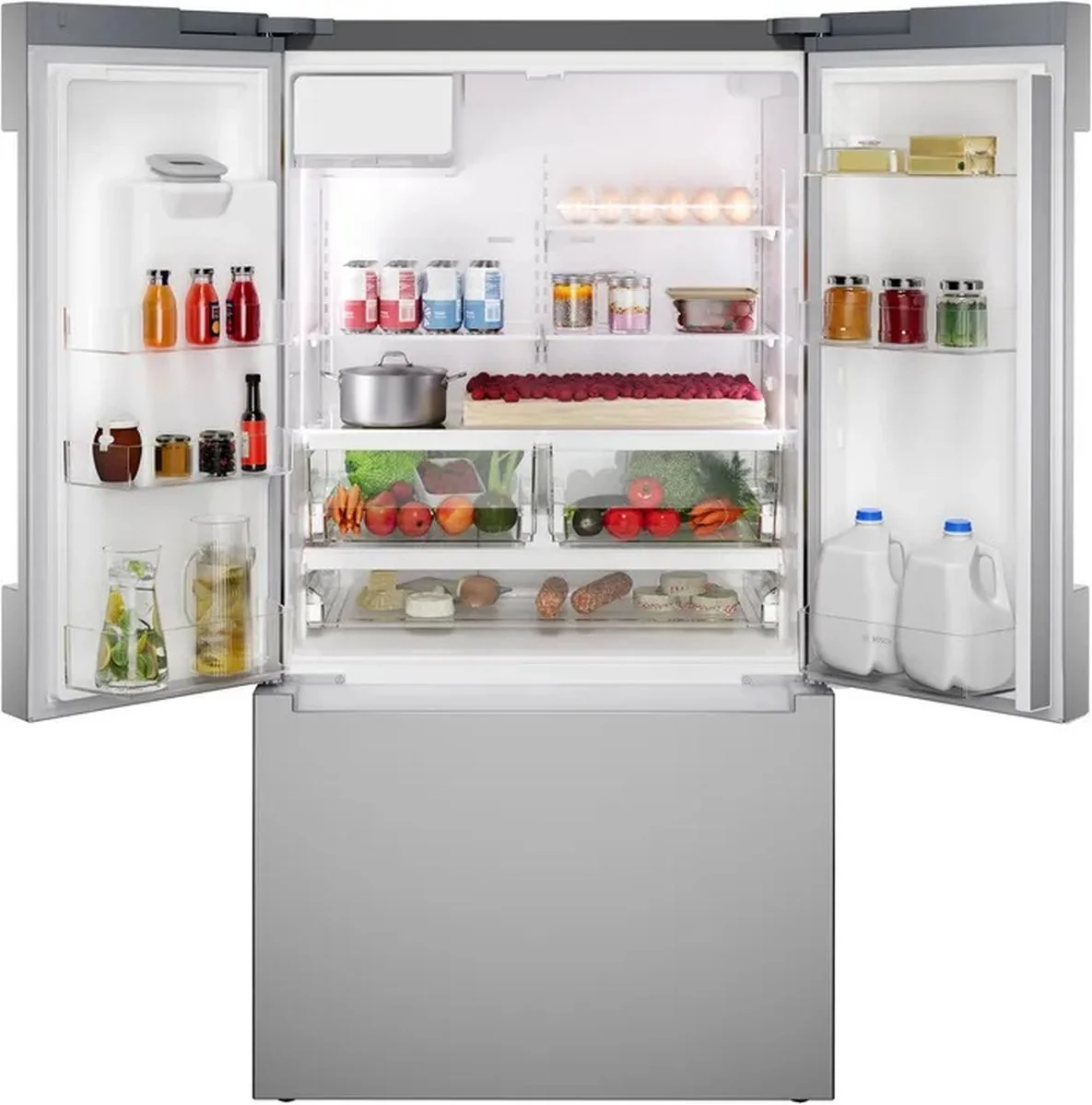 Bosch B36CD10ENS external QuickIce Pro ice maker bucket extended from the left door, showing crescent ice cubes and the 8 lbs per day production system