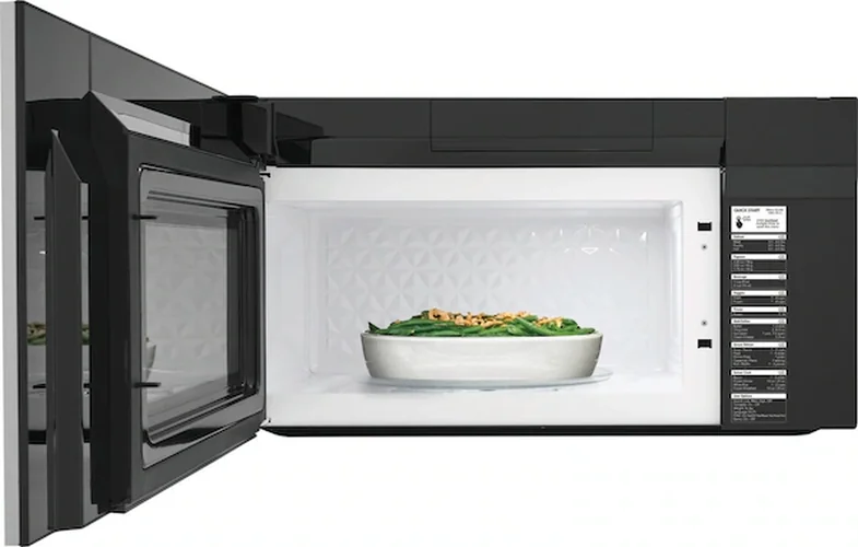 Frigidaire Gallery GMOS1964AF over-the-range microwave shown open with white interior