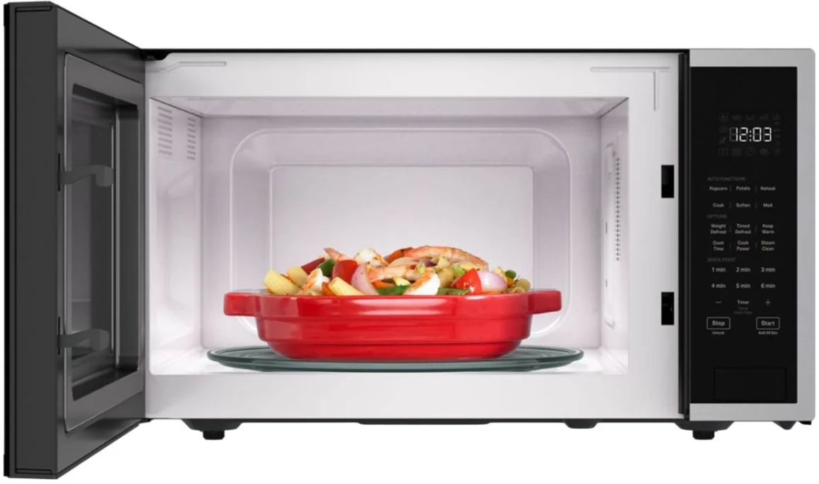 KitchenAid KMCS324RPS countertop microwave shown open with food inside