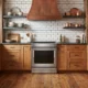 KitchenAid KSIS730PSS induction range in a modern rustic kitchen