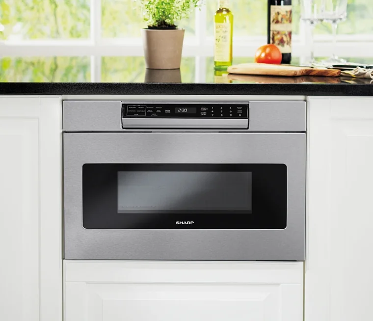 Sharp SMD2470ASY stainless steel microwave drawer installed below a kitchen counter