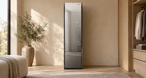 Mirrored LG S3MFBN Styler in a warm dressing room with plaster walls and pale oak cabinetry