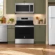 AI-generated kitchen illustration with a microwave, dishwasher, electric range and white top-freezer refrigerator.