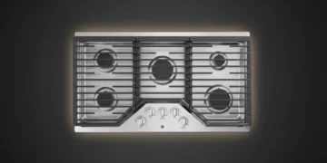 ge-jgp5036slss-36-inch-gas-cooktop-5-burner-layout GE JGP5036SLSS 36-inch gas cooktop overhead view showing 5-burner configuration with continuous cast-iron grates
