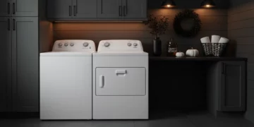 Whirlpool WGD4850HW white gas dryer and matching washer in modern dark laundry room